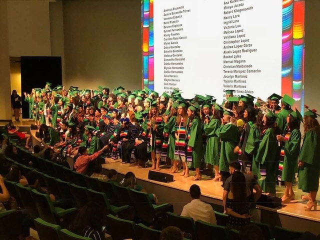 Graduates on stage